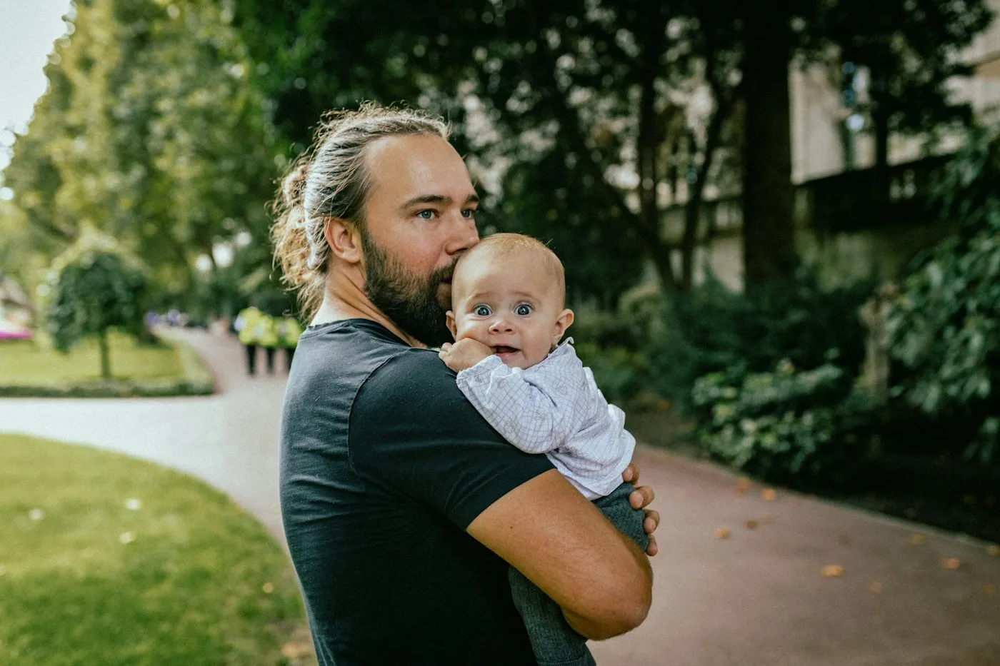 A father holding his baby close